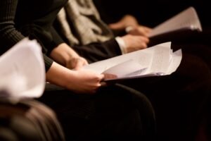 young woman reading a script